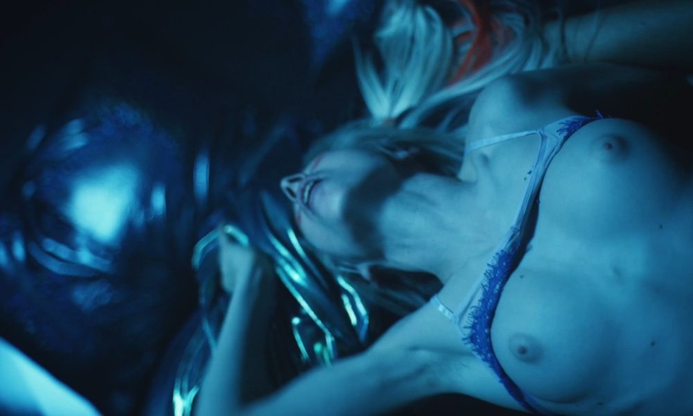 Sydney Sweeney and Hunter Schafer are having lesbian sex in a dance club. d...